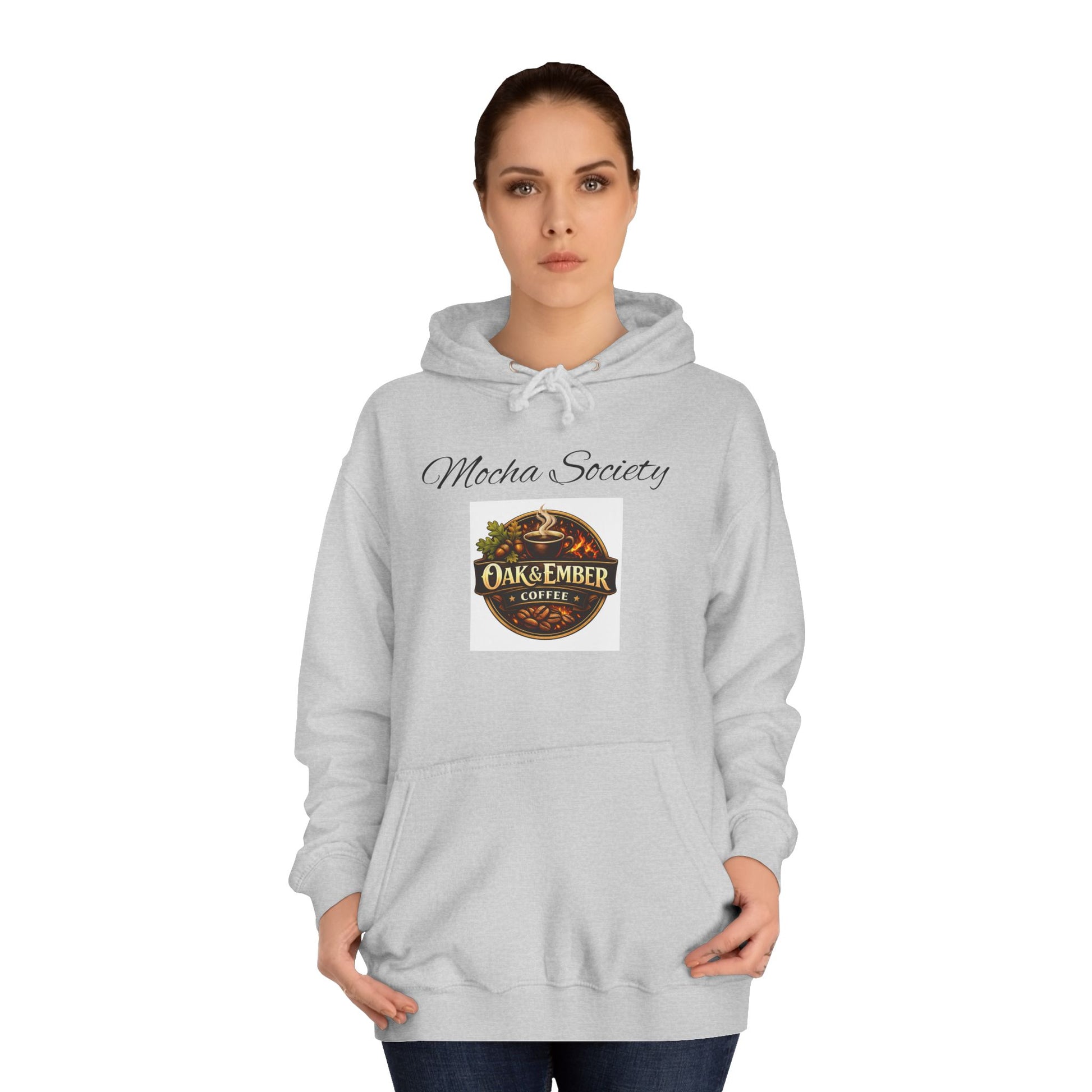 Person wearing a gray hoodie with a logo on a white background
