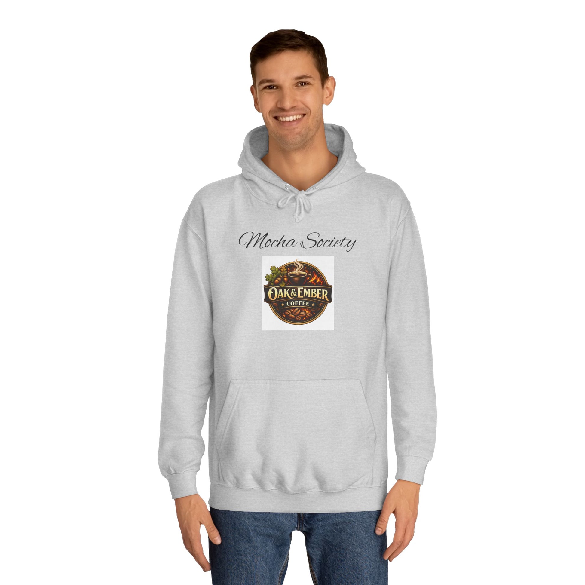Man wearing a gray hoodie with a logo and text on a white background